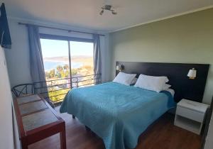 Postel nebo postele na pokoji v ubytování Yemanya Hostal