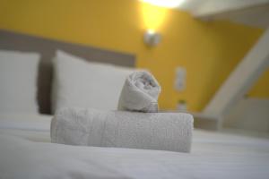 Voodi või voodid majutusasutuse Vila Storia toas