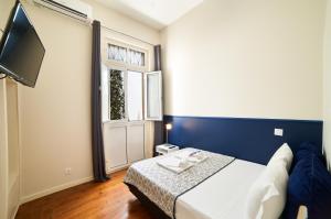 Cama o camas de una habitación en Baron Faro - Guest House