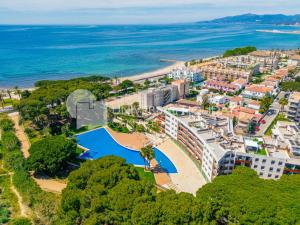 an aerial view of a resort and the ocean at UHC SOL CAMBRILS PARK in Cambrils