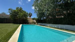 The swimming pool at or close to Mas Pinell 31C