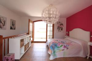 En eller flere senge i et værelse på Arenal