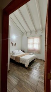 En eller flere senge i et værelse på Lindo Apartamento ubicado a 3 cuadras de Plaza Mayor