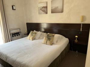 Postel nebo postele na pokoji v ubytování hôtel Le Synaya