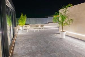 Balkón nebo terasa v ubytování Isgrò Rooms
