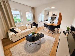 Posezení v ubytování Flat Bull Appartement mit Garten