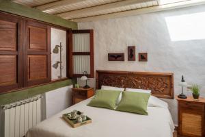 Postel nebo postele na pokoji v ubytování Casa Poniente + 18 fotografií