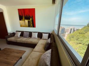 Khu vực ghế ngồi tại Suite Riverfront Puerto Santa Ana
