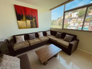Khu vực ghế ngồi tại Suite Riverfront Puerto Santa Ana