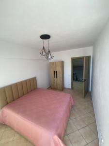 Кровать или кровати в номере Duplex Durres