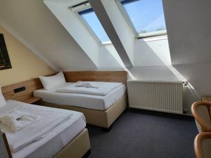Postel nebo postele na pokoji v ubytování Hotel Harzresidenz