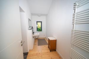 Ένα μπάνιο στο Ferienwohnung mit Seeblick +14 φωτογραφίες