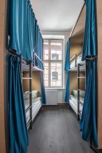 Postel nebo postele na pokoji v ubytování Happy Street Hostel