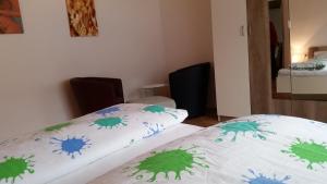 Voodi või voodid majutusasutuse Urlaubsnest toas