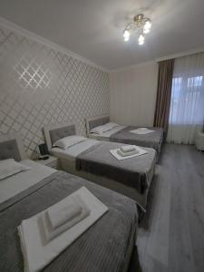 Postel nebo postele na pokoji v ubytování Hotel Rabat Castle