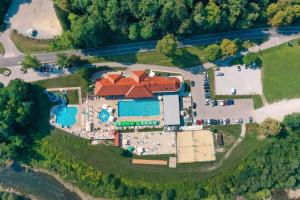 an aerial view of a large building with a pool at Hotel Aqua Roma in Rimske Toplice