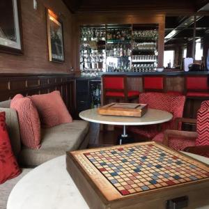 a room with a chess board on a table at Inn By the Sea in Cape Elizabeth