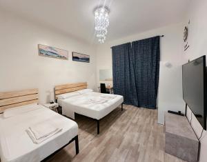 Postel nebo postele na pokoji v ubytování BED & BREAKFAST SAKURA