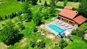 an overhead view of a house with a swimming pool at Silver Juglans Holiday Home in Čazma