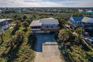 an aerial view of a house with a pool at Beachside Bliss in Saint Augustine
