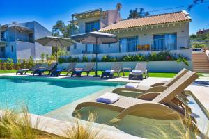 Бассейн в CorfuVille Luxury Villas или поблизости