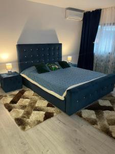 Ένα ή περισσότερα κρεβάτια σε δωμάτιο στο Apartament NECTARIA +18 φωτογραφίες