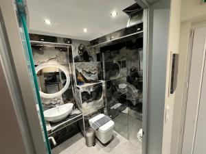 a bathroom with a sink and a mirror at Crystal Blue in Potos +91 photos