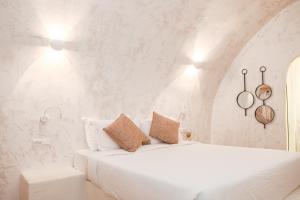 תמונה מהגלריה של White Curves Santorini באקרוטירי