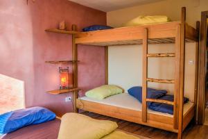 a bunk bed room with two bunk beds at Apartment Kamacir in Kobarid