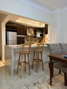 Kuchyň nebo kuchyňský kout v ubytování Cozy Flat near Cairo Airport