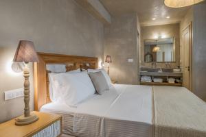 Postel nebo postele na pokoji v ubytování Zeus Luxury Villas - Villa Poseidon + 22 fotografií