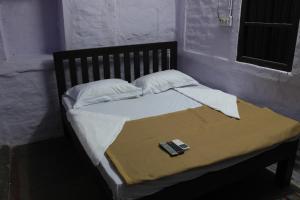 Cama o camas de una habitación en Madhur Villa Guest House
