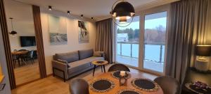 Et opholdsområde på Studio Baltic Garden NADMORSKI RAJ Sztutowo