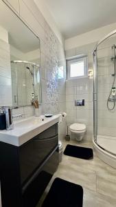 Kúpeľňa v ubytovaní Apartments Anica