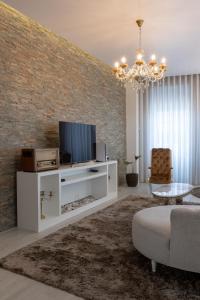 Et tv og/eller underholdning på Cidadela do Viriato Deluxe