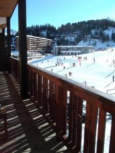 a view of a skating rink with people on it at Résidence Le Makalu - 3 Pièces 6/7 pers - LE MAKALU - 036MA - PLAGNE CENTRE MAE-5974 in Aime La Plagne