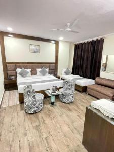Postel nebo postele na pokoji v ubytování Hotel Radiance