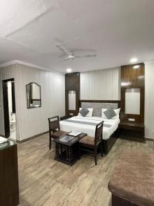 Postel nebo postele na pokoji v ubytování Hotel Radiance
