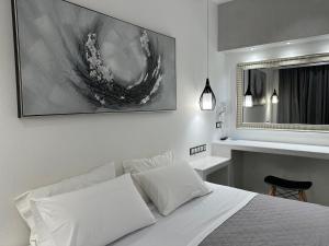 Voodi või voodid majutusasutuse Aphrodite Hotel & Apartments toas