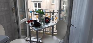 Balkón alebo terasa v ubytovaní Paryskie Studio w sercu Warszawy