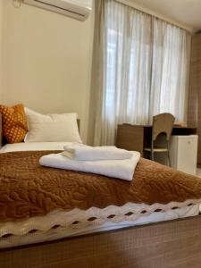 Postel nebo postele na pokoji v ubytování Хостел Атлас - Hostel Atlas