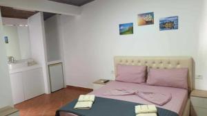 Postel nebo postele na pokoji v ubytování GuestHouse Borsh + 21 fotografií