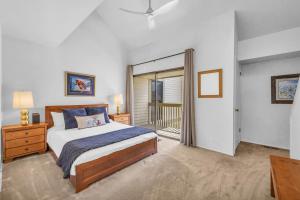 a bedroom with a large bed and a balcony at Modern 3BR in Serene Area Near Ski Slopes and Town in Park City