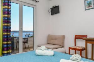 TV a/nebo společenská místnost v ubytování Apartment Goran