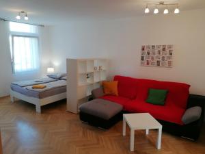 Ένα ή περισσότερα κρεβάτια σε δωμάτιο στο Hanna Apartman 1-2