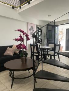Posezení v ubytování Cabo Lofts