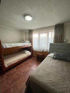Postel nebo postele na pokoji v ubytování Hotel Santa Sofia