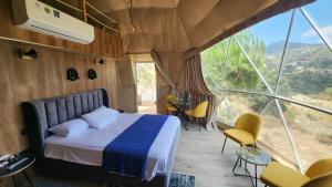 Postel nebo postele na pokoji v ubytování Agros Glamping Boutique
