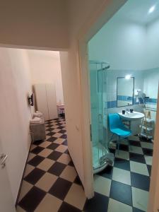 A bathroom at Manì Rooms Még 37 kép