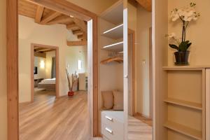 Łóżko lub łóżka w pokoju w obiekcie Resort Tirol Brixen am Sonnenplateau